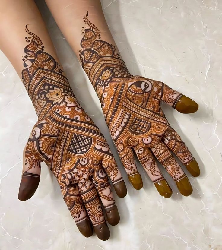 Traditional Indian mehandi with peacock and paisley motifs